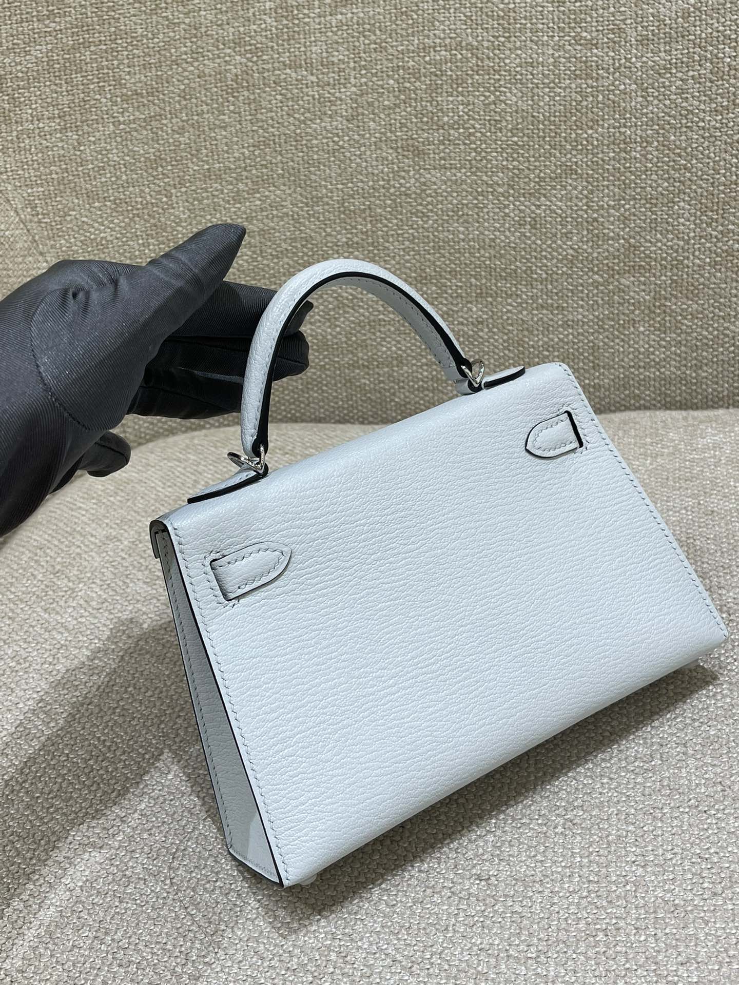 Hermès Model: Kelly Mini 2nd Generation Color: Smoky Blue with Silver Hardware Dimensions: 19cm x 12cm x 5.5cm