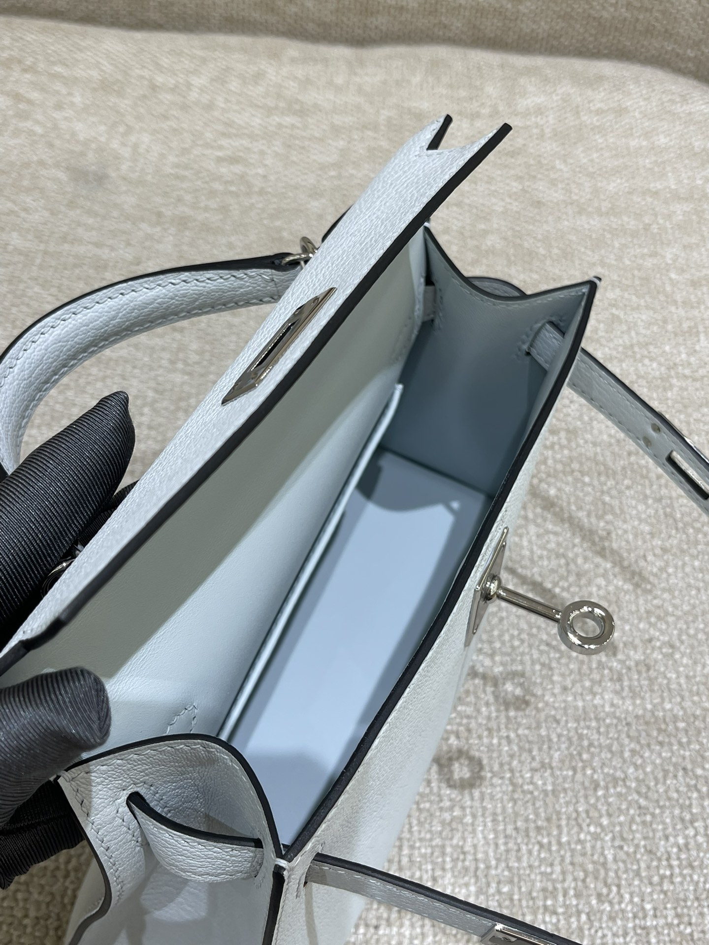 Hermès Model: Kelly Mini 2nd Generation Color: Smoky Blue with Silver Hardware Dimensions: 19cm x 12cm x 5.5cm