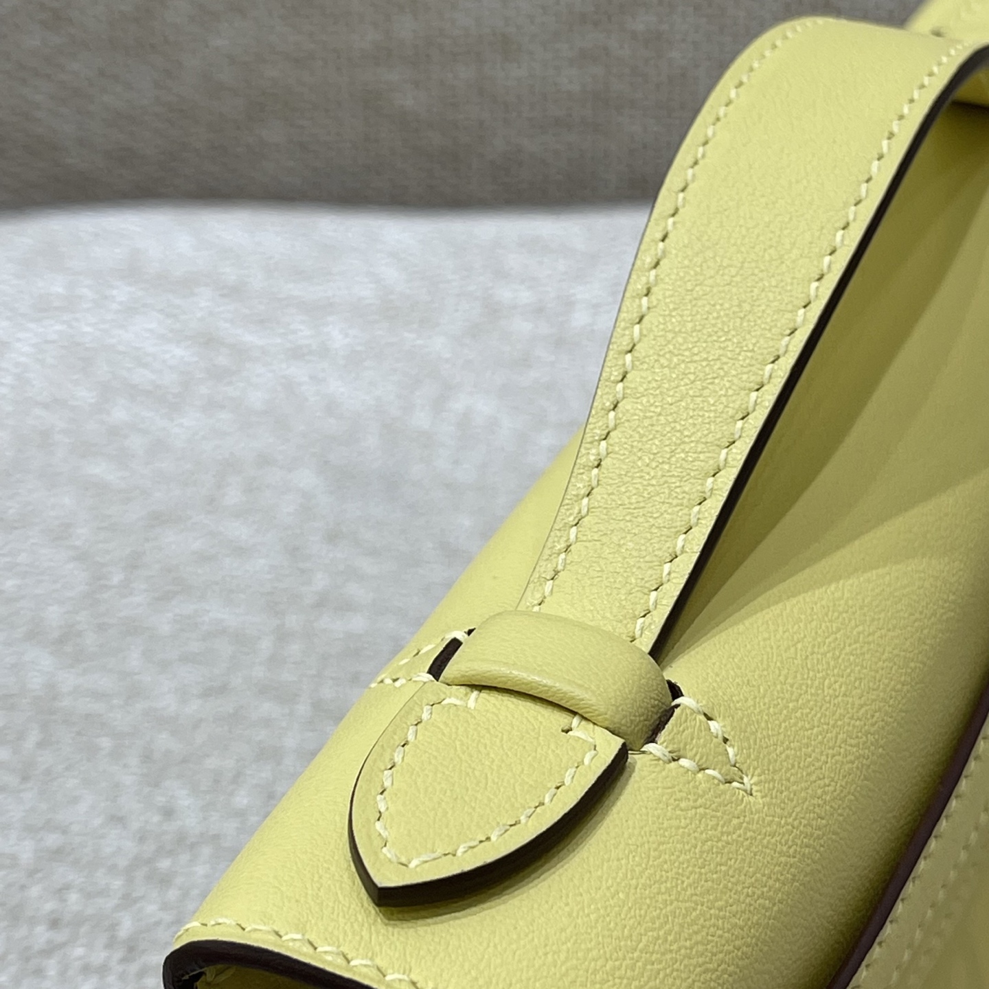 Hermès Model: Kelly Mini First Generation Color: Chick Yellow with Silver Hardware Dimensions: 22cm x 14cm x 7cm