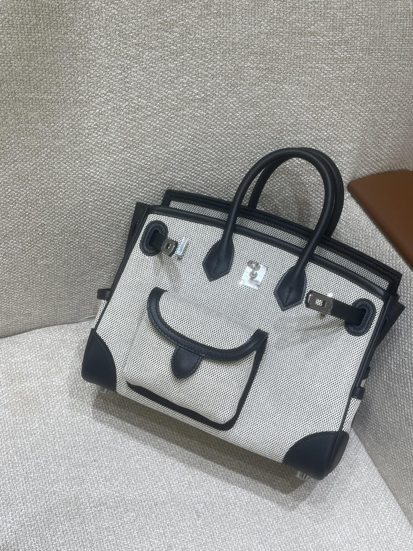Hermès Model: Birkin 25 Color: Panda with Silver Hardware Dimensions: 25cm x 20cm x 13cm