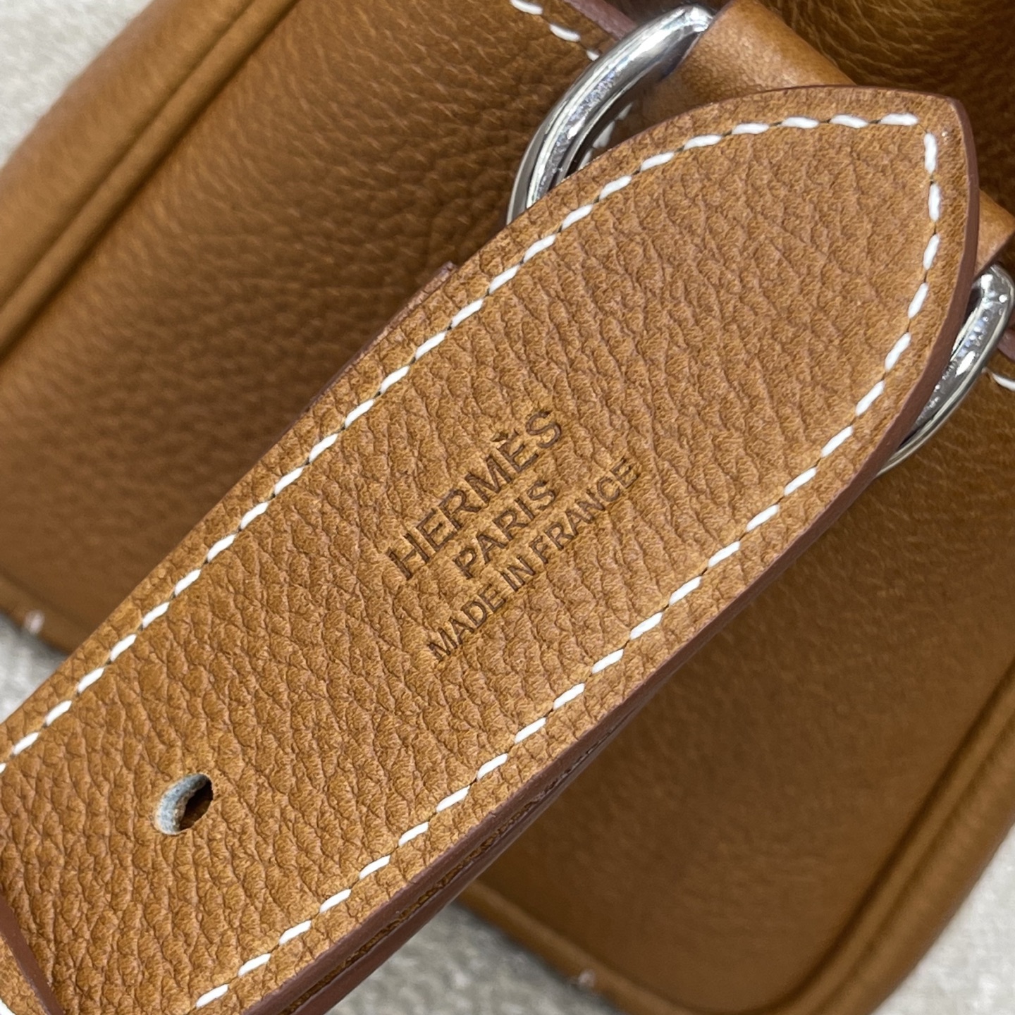 Hermès Model: Kelly 34 Messenger Color: Golden Brown with Silver Hardware Dimensions: 27cm x 10cm x 19cm