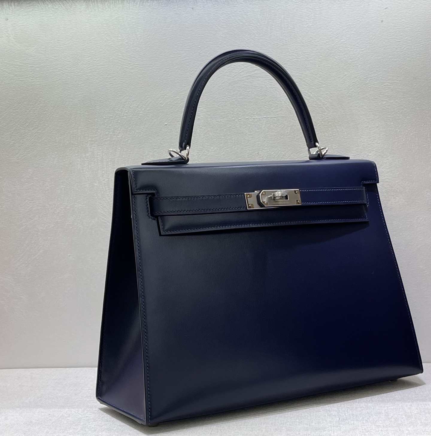 Hermès Model: Keely32 Color: Midnight Blue with Silver Buckle Dimensions: 32 × 23 × 11 cm (including handle)