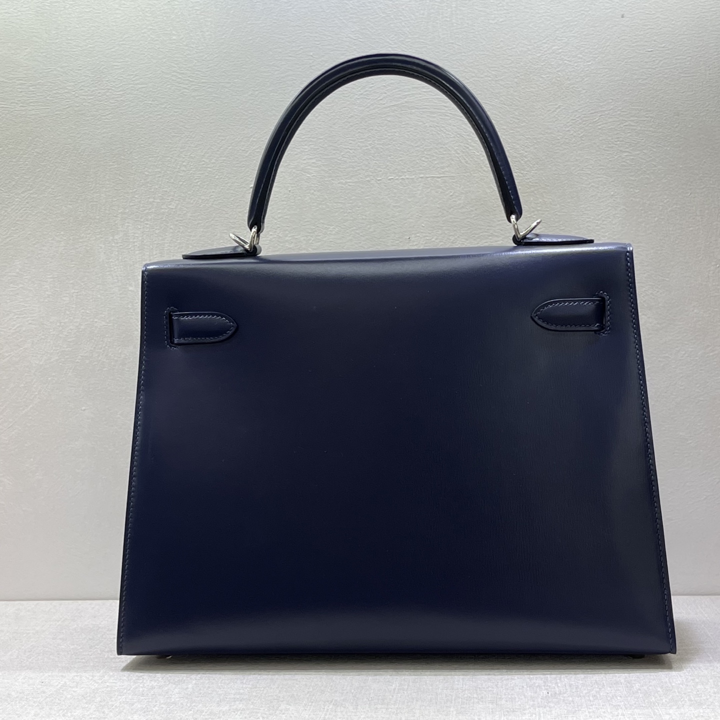 Hermès Model: Keely32 Color: Midnight Blue with Silver Buckle Dimensions: 32 × 23 × 11 cm (including handle)