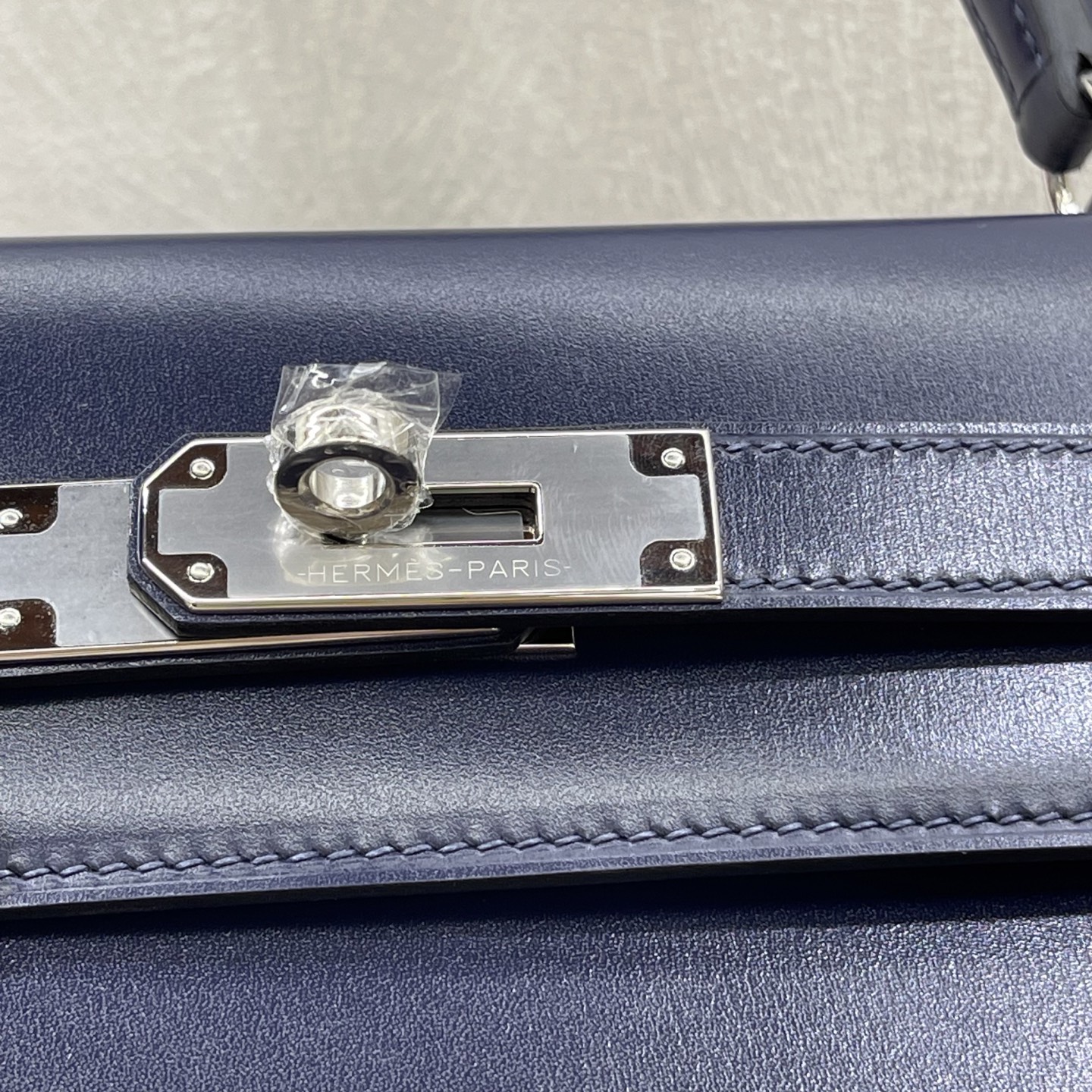 Hermès Model: Keely32 Color: Midnight Blue with Silver Buckle Dimensions: 32 × 23 × 11 cm (including handle)