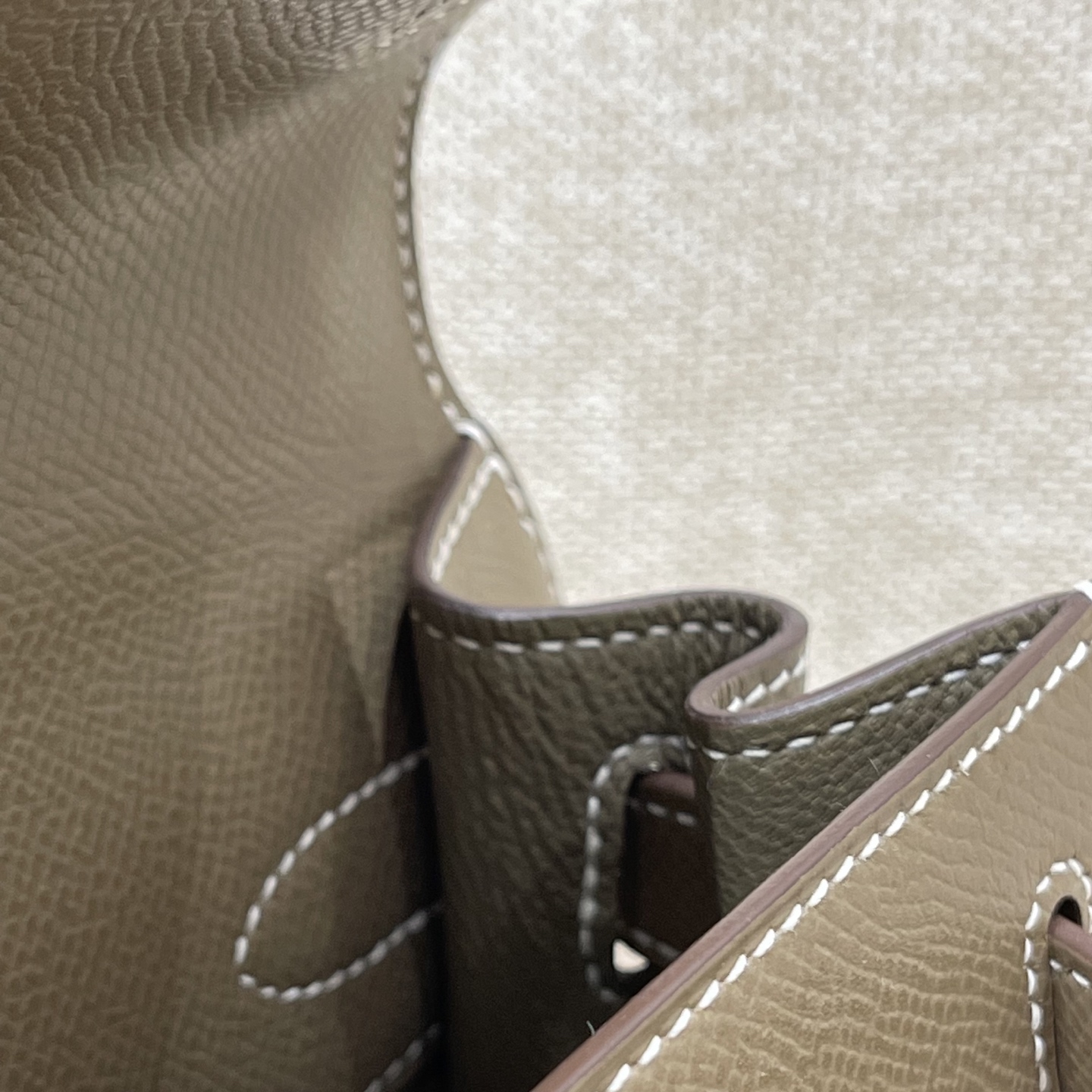 Hermès Model: Kelly 28 (Exterior Stitching) Color: Elephant Gray with Gold Hardware Dimensions: 28cm x 22cm x 10cm (including handles)