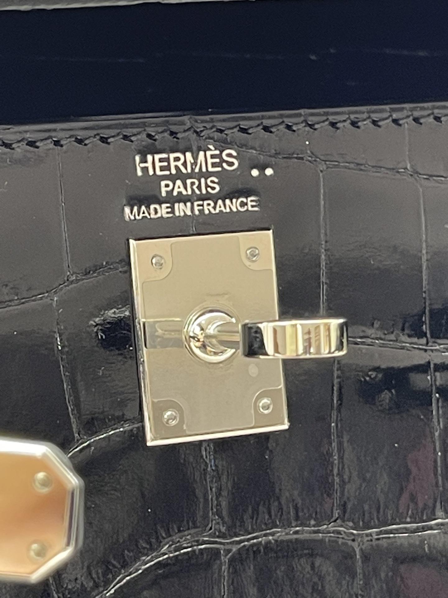 Hermès Model: Kelly 25 (Exterior Stitching) Color: Black with Silver Hardware Dimensions: 25cm x 9.5cm x 27cm (including handles)
