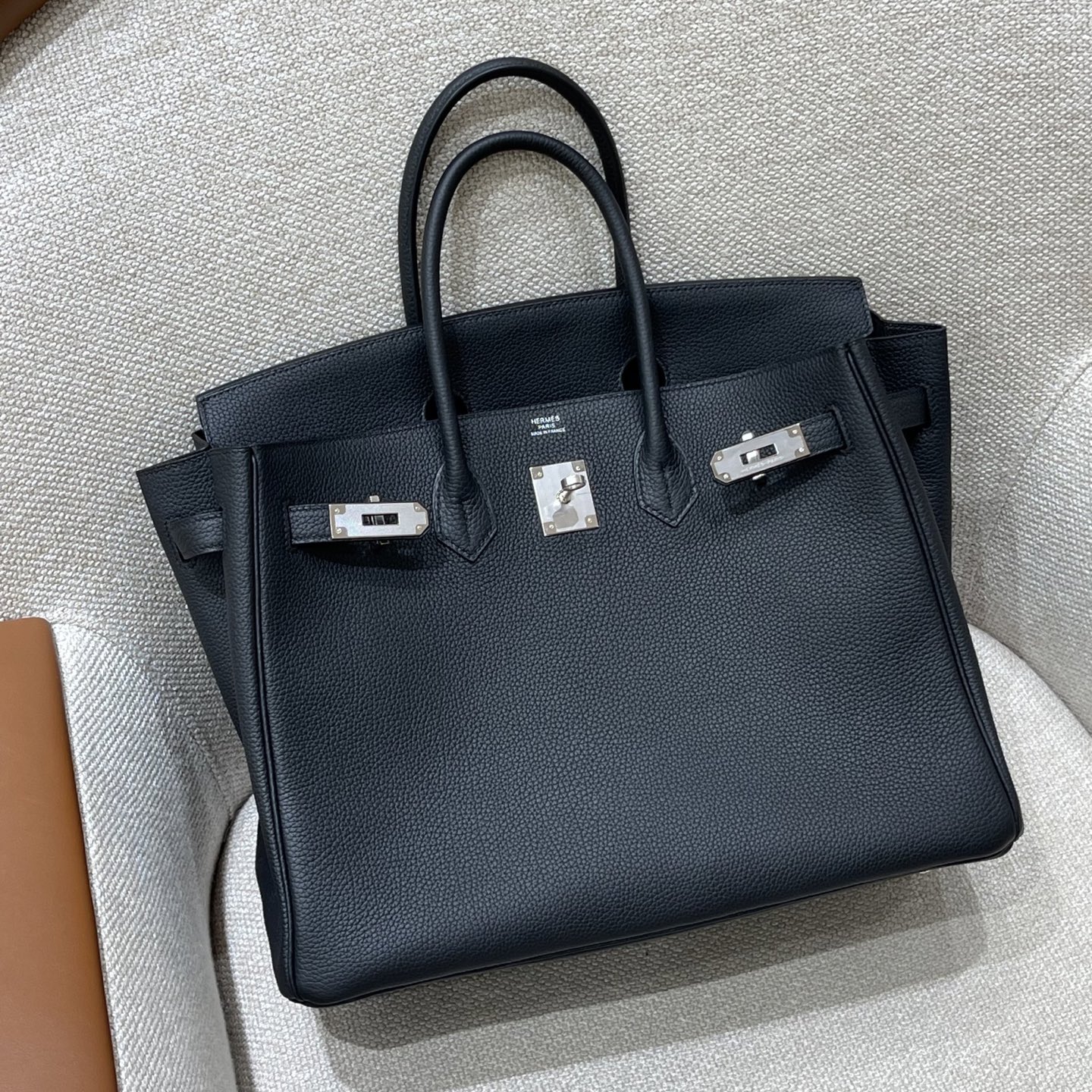 Hermès Model: Birkin 35 Color: Black with silver hardware Dimensions: 35cm x 25cm x 18cm