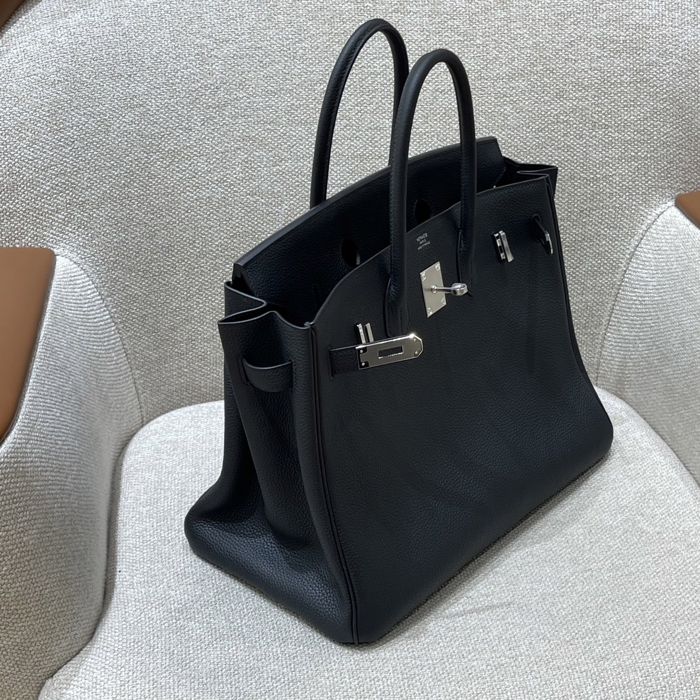 Hermès Model: Birkin 35 Color: Black with silver hardware Dimensions: 35cm x 25cm x 18cm