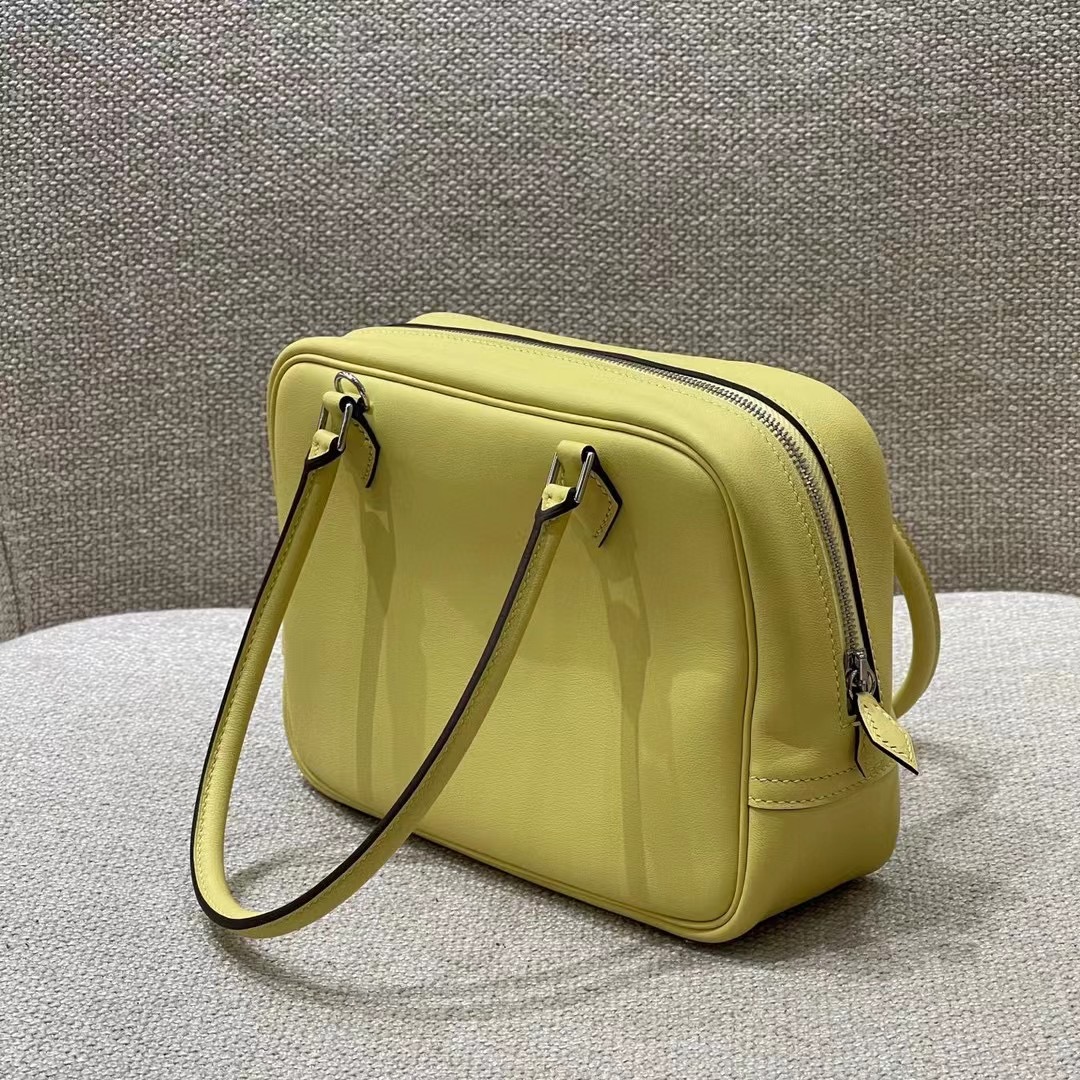 Hermès Model: Mini Plume Color: Chick Yellow Dimensions: 21cm x 15cm x 7.5cm