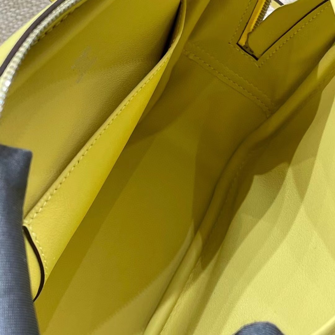 Hermès Model: Mini Plume Color: Chick Yellow Dimensions: 21cm x 15cm x 7.5cm