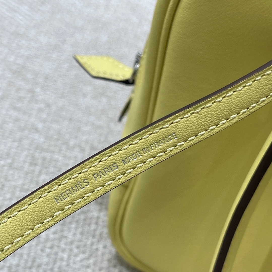 Hermès Model: Mini Plume Color: Chick Yellow Dimensions: 21cm x 15cm x 7.5cm