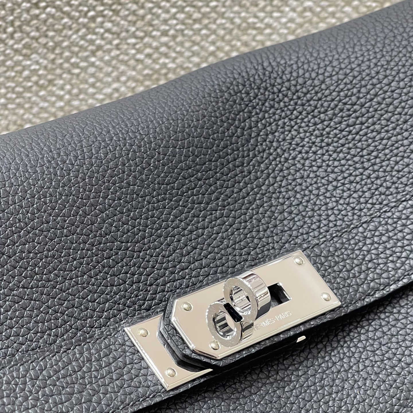 Hermès Model: Kelly 34 Messenger Color: Black with Silver Hardware Dimensions: 34cm x 27cm x 14cm