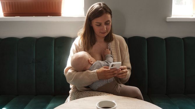 A mother breastfeeding her child