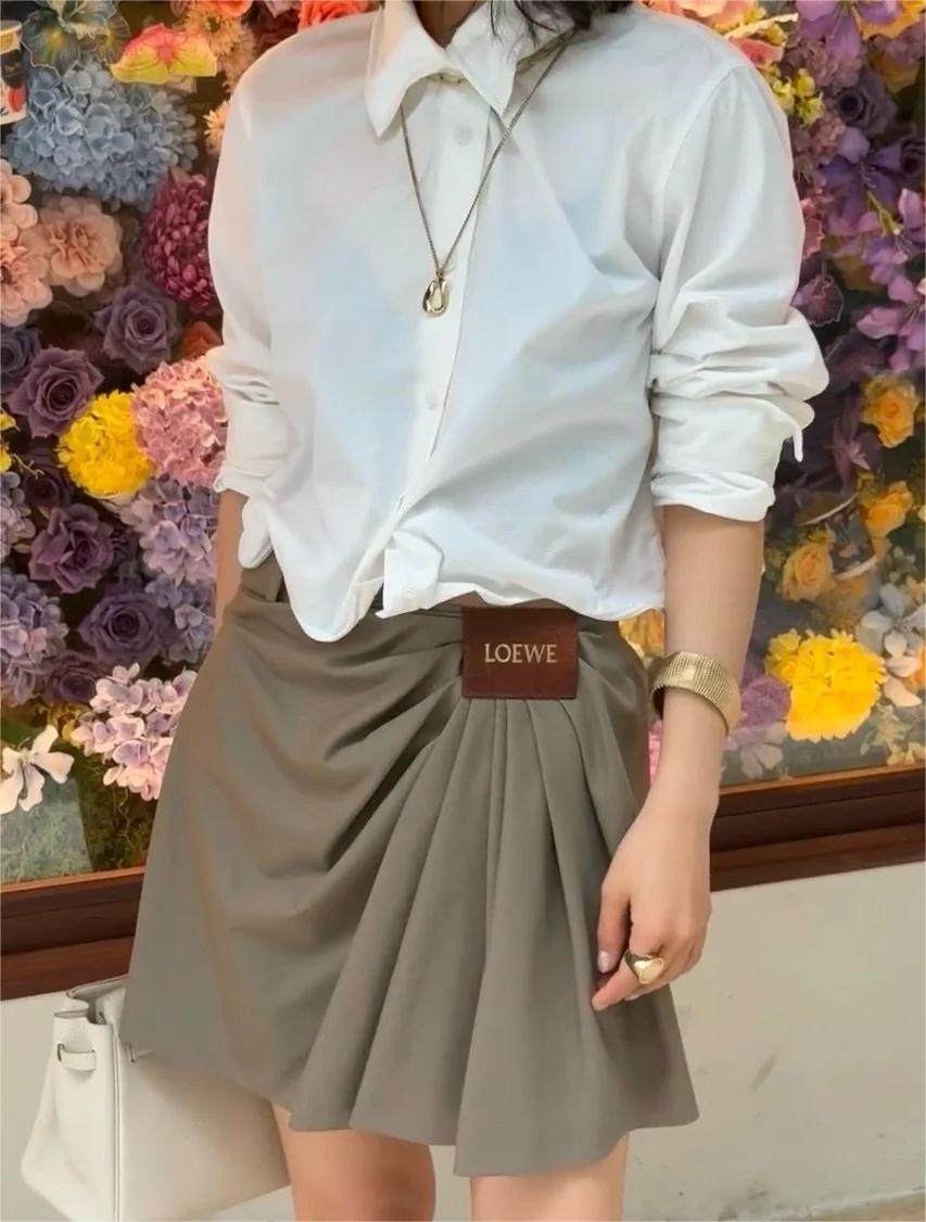 LOE25SS Leather Label Logo Half Skirt