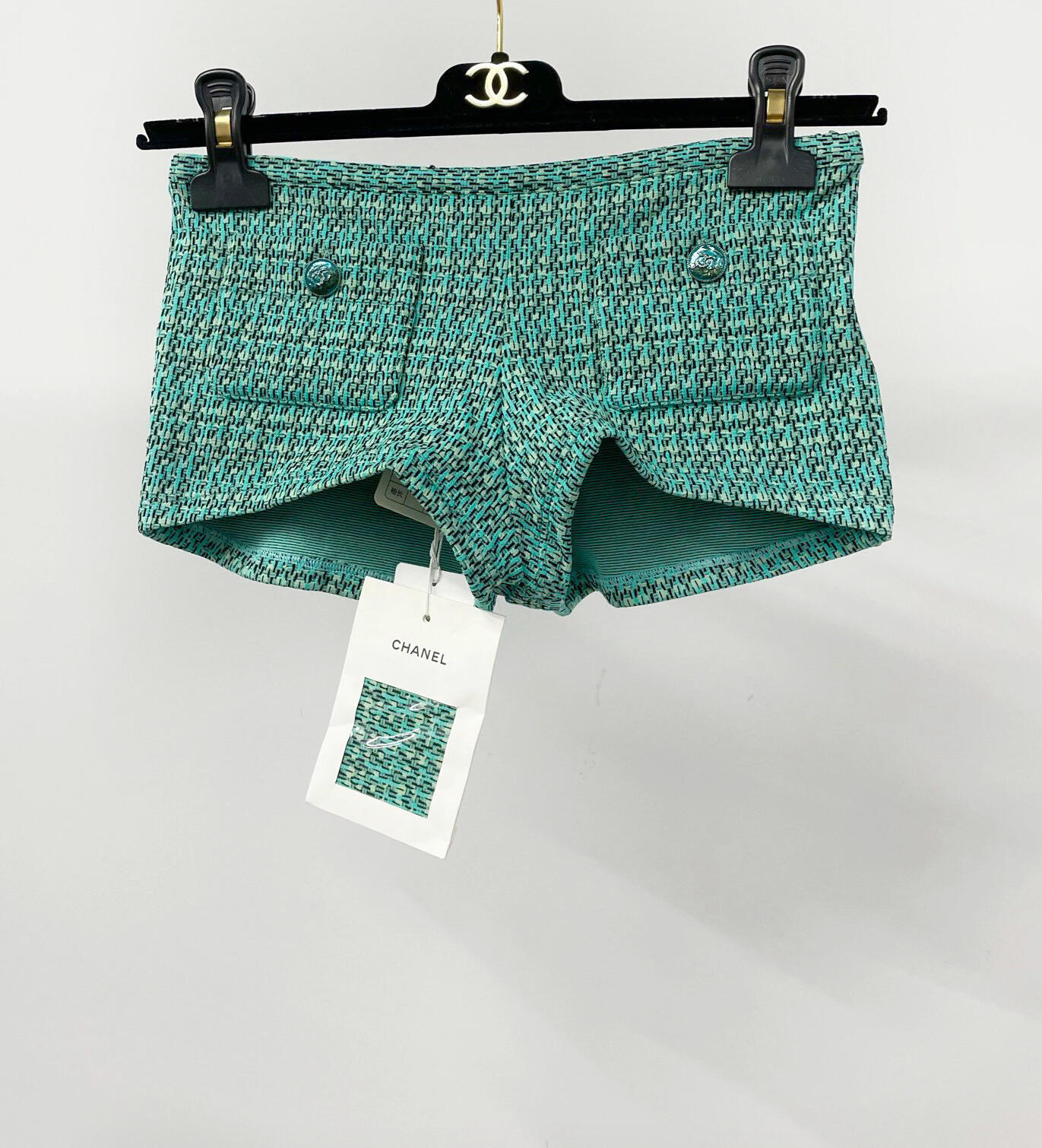 CHNEL green tweed shorts