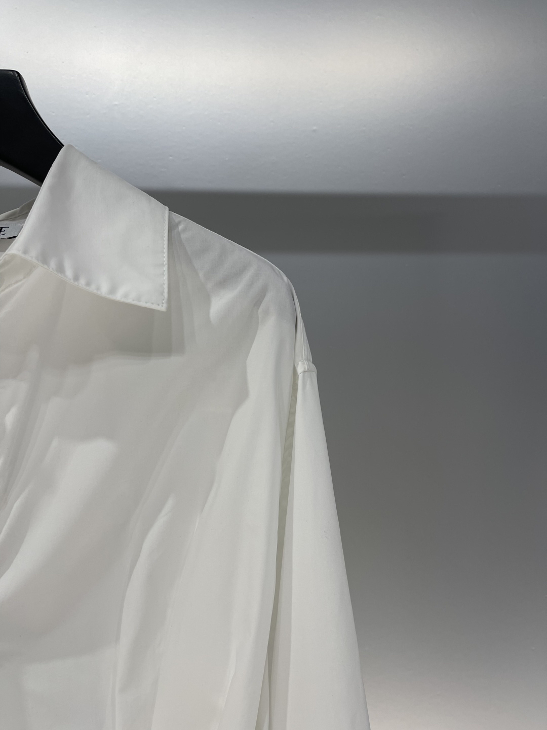 LOE monogrammed embroidered leather label long sleeve shirt