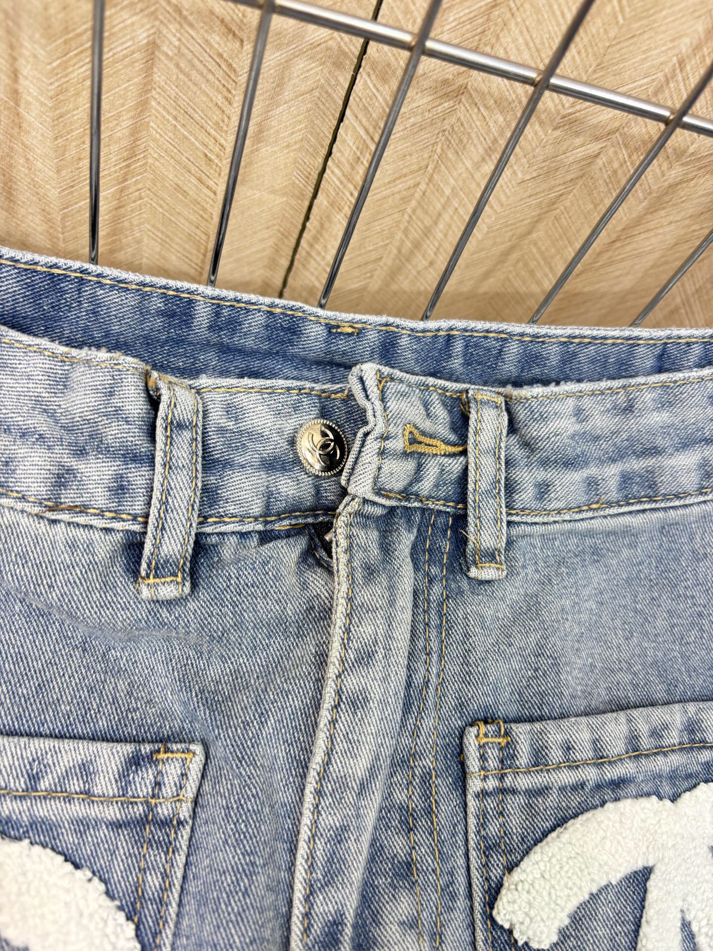 CHANE25SS embroidered denim straight leg trousers