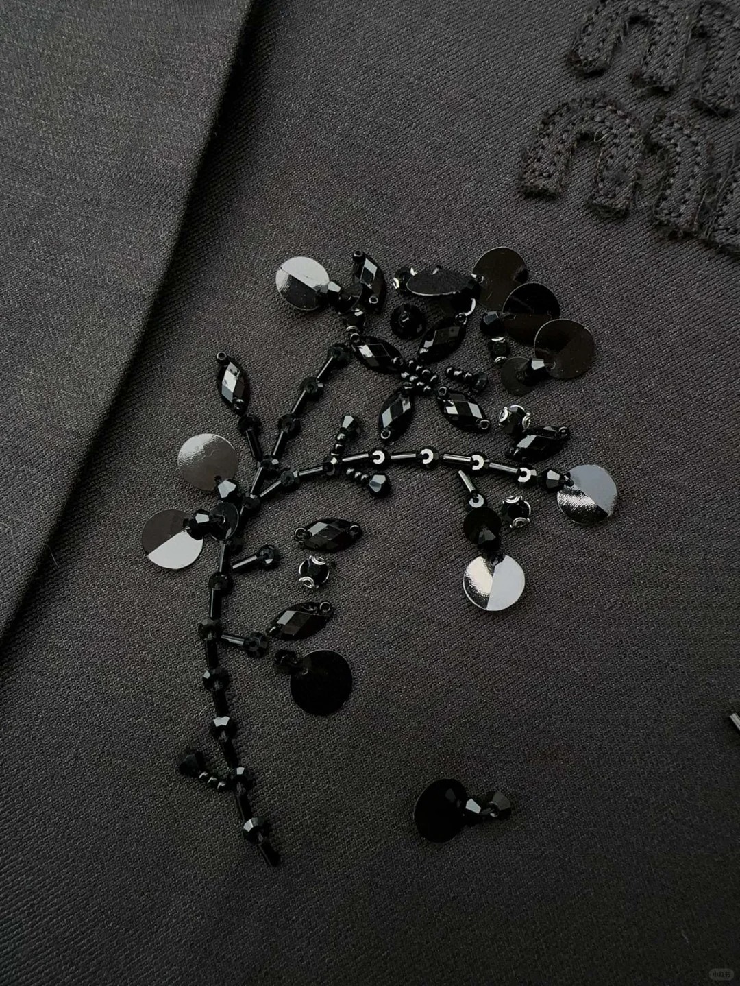 MIU short blazer with handmade shimmering beadwork embroidery