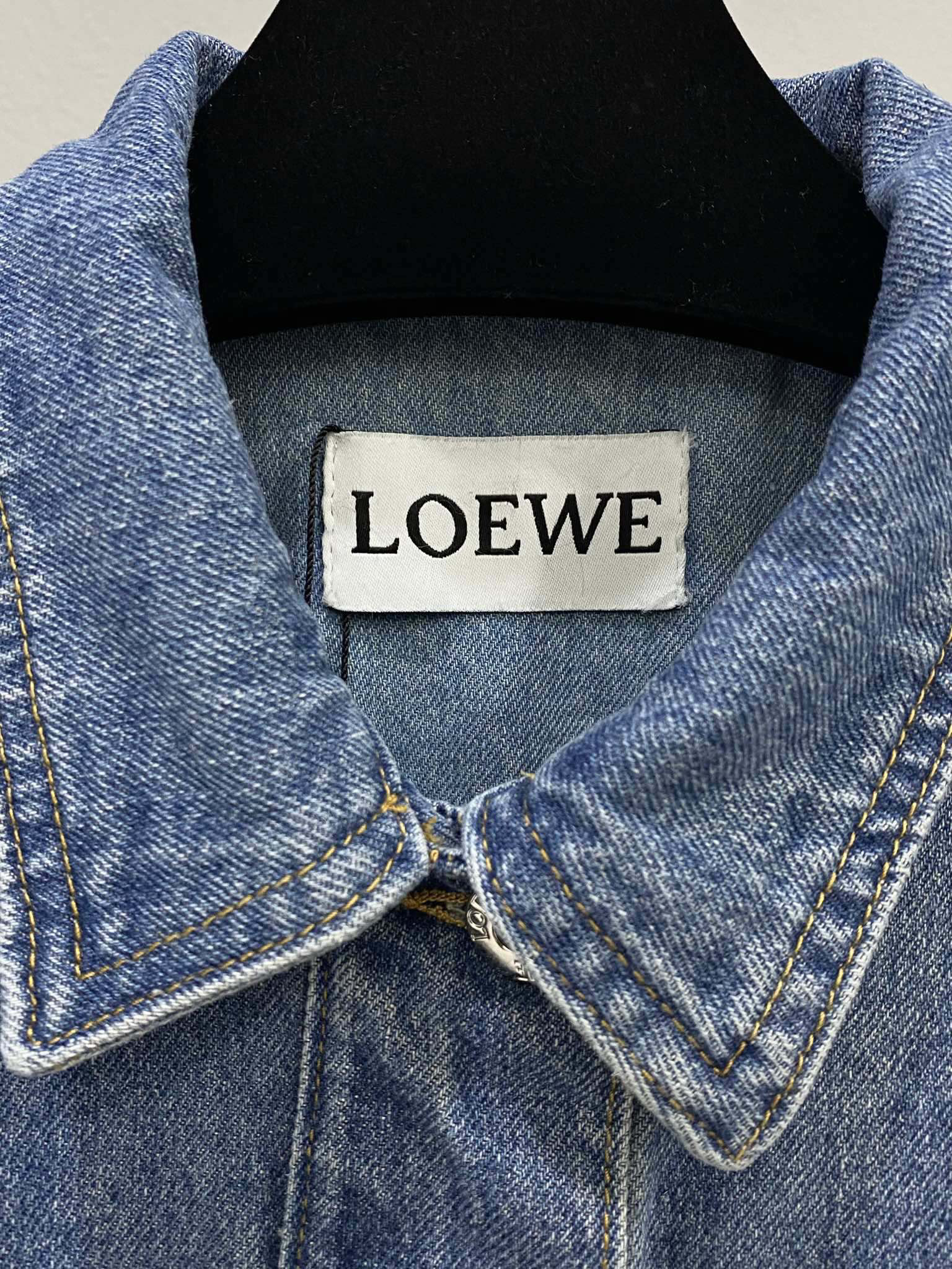 LOE25SS leather embossed logo denim jacket