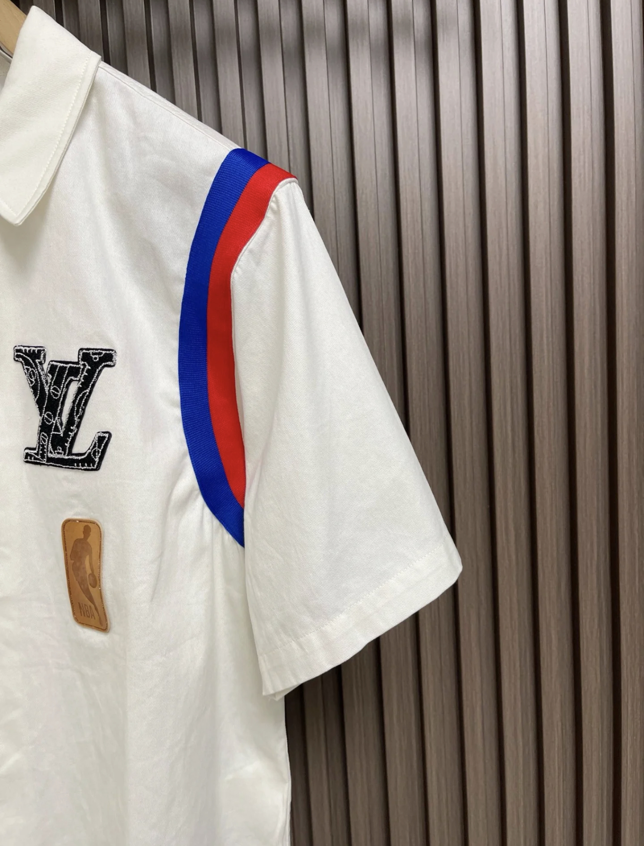 1V NBA Co branded short sleeved POLO