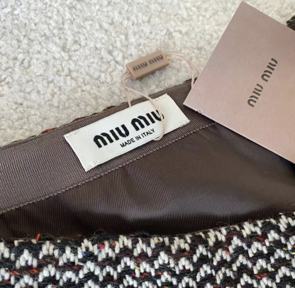 MM Golden sequin woolen short skirt