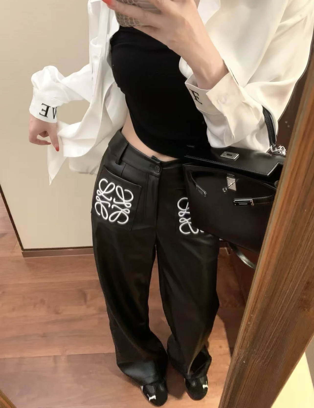 LEW Big logo long leather pants