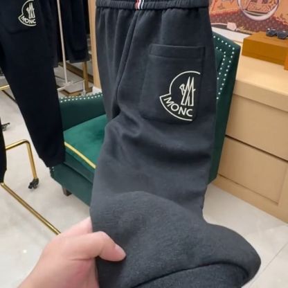 冬用フリース裏地付きメンズカジュアルパンツ、スタイリッシュなルーズフィットスウェットパンツ