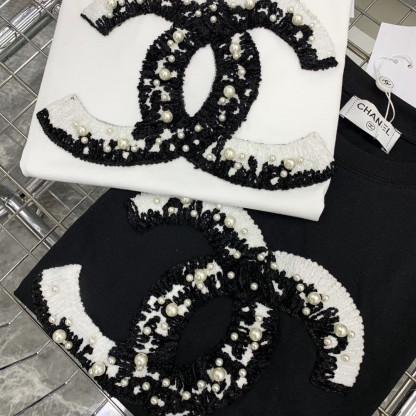 夏の新作、丈夫なビーズ付き純綿の半袖ゆったりカジュアルラウンドネックTシャツ。多用途に使えます。