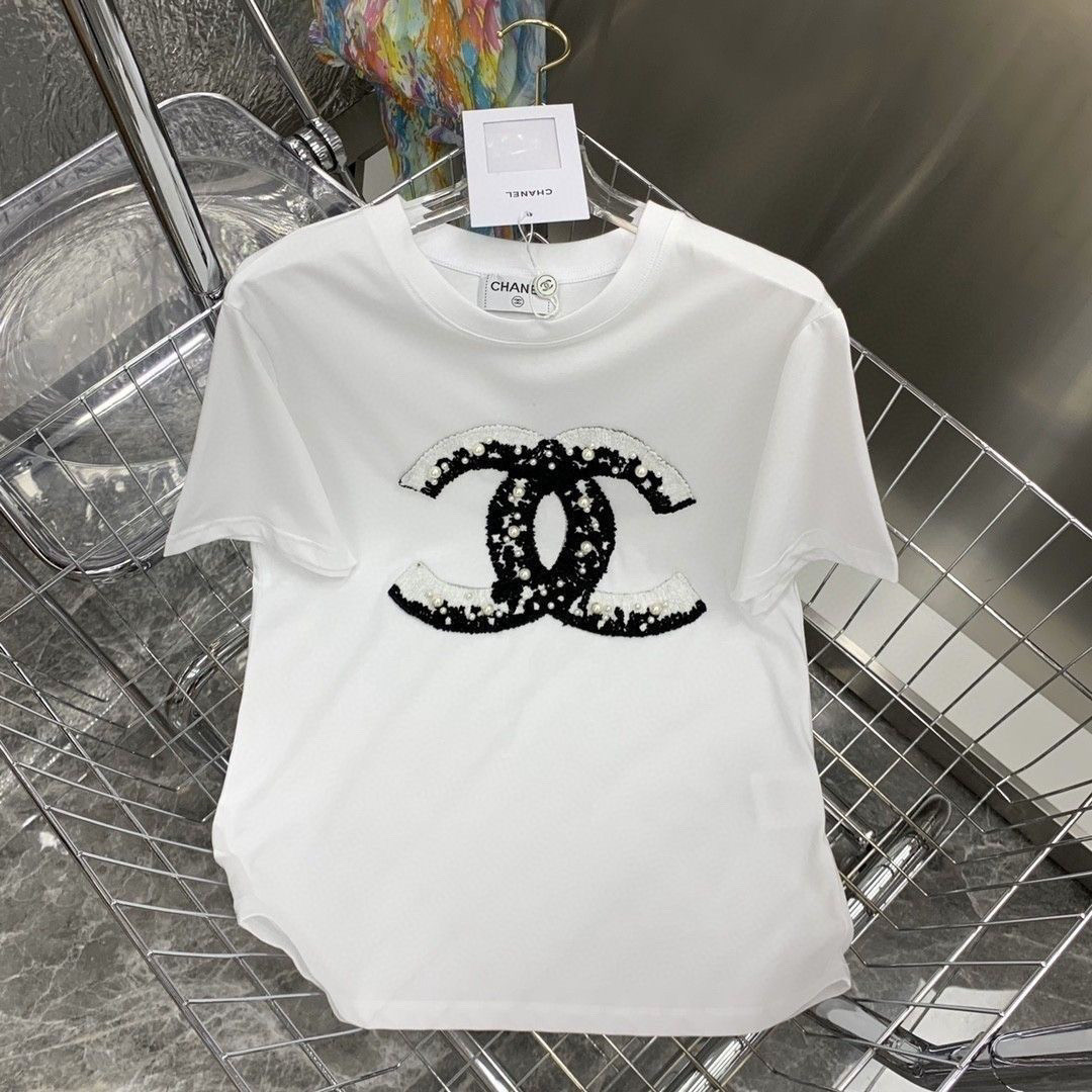 夏の新作、丈夫なビーズ付き純綿の半袖ゆったりカジュアルラウンドネックTシャツ。多用途に使えます。