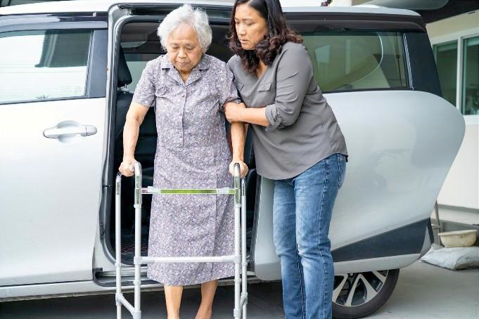 walker in front of van