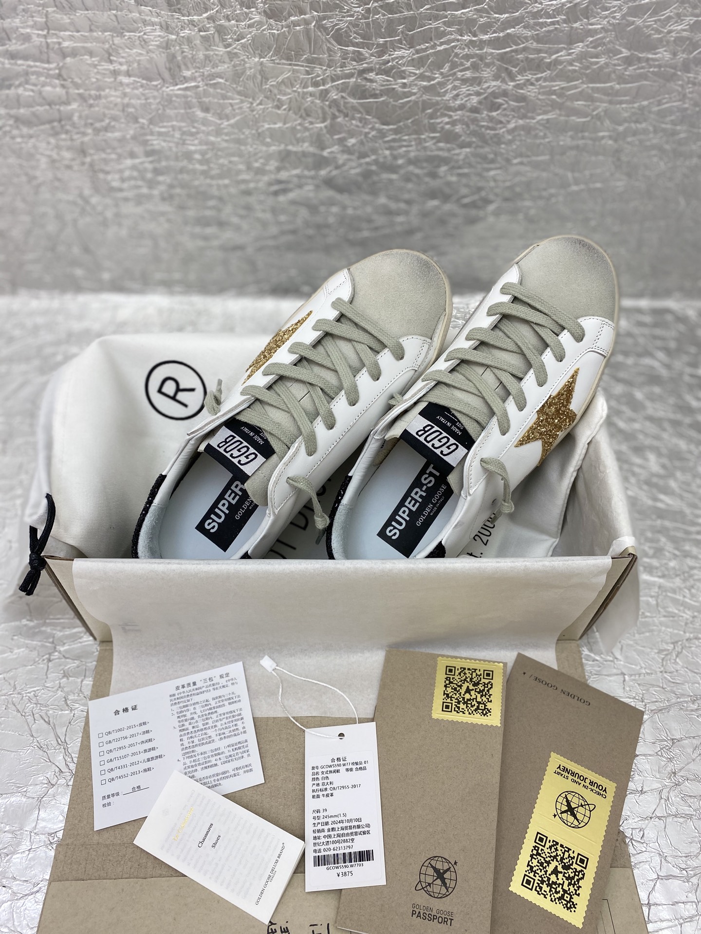 Golden Goose Super-Star in nappa leather with gold glitter star and black glitter heel tab