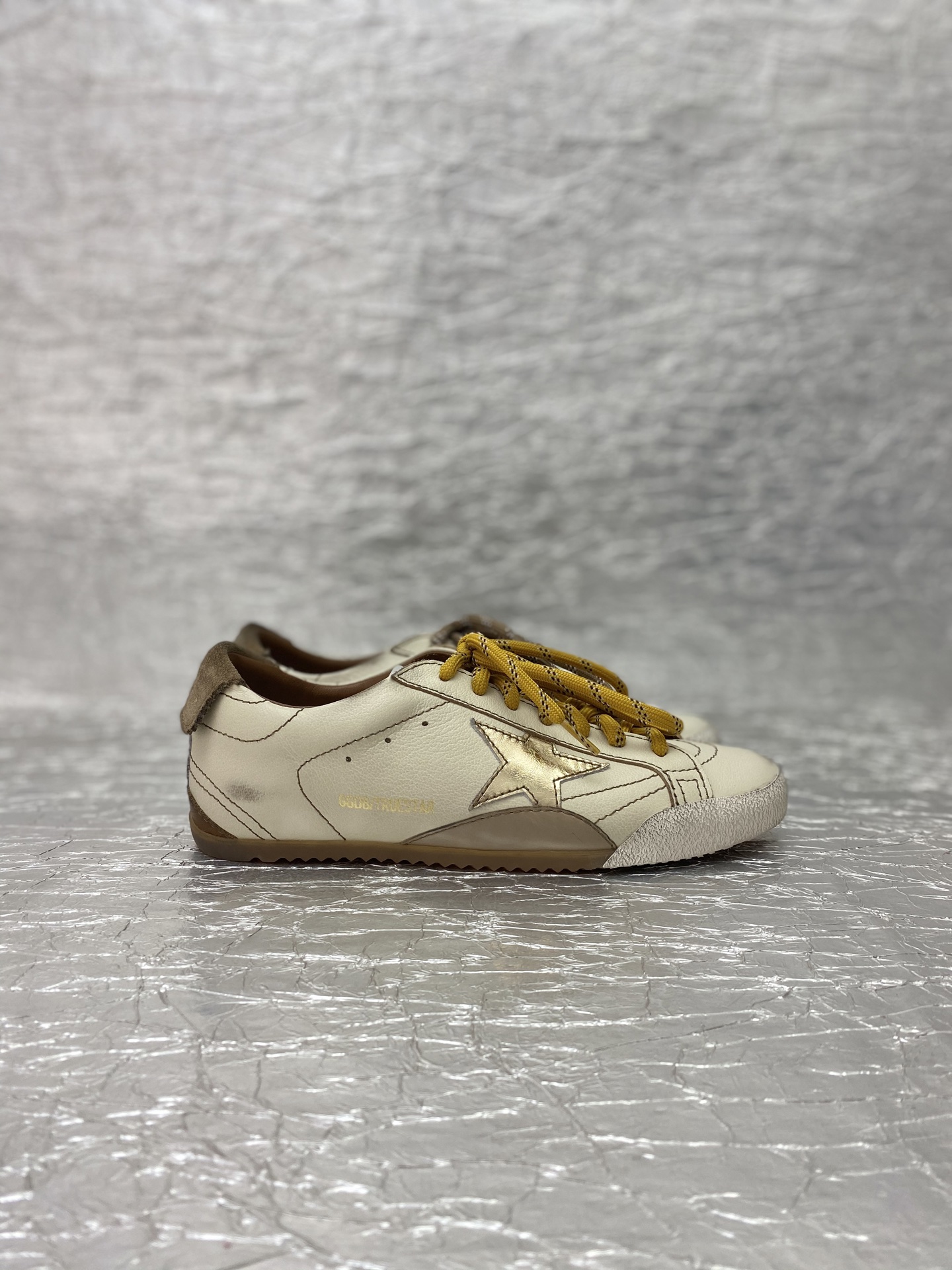 Golden Goose True-Star in white nappa leather with gold star and beige suede heel tab