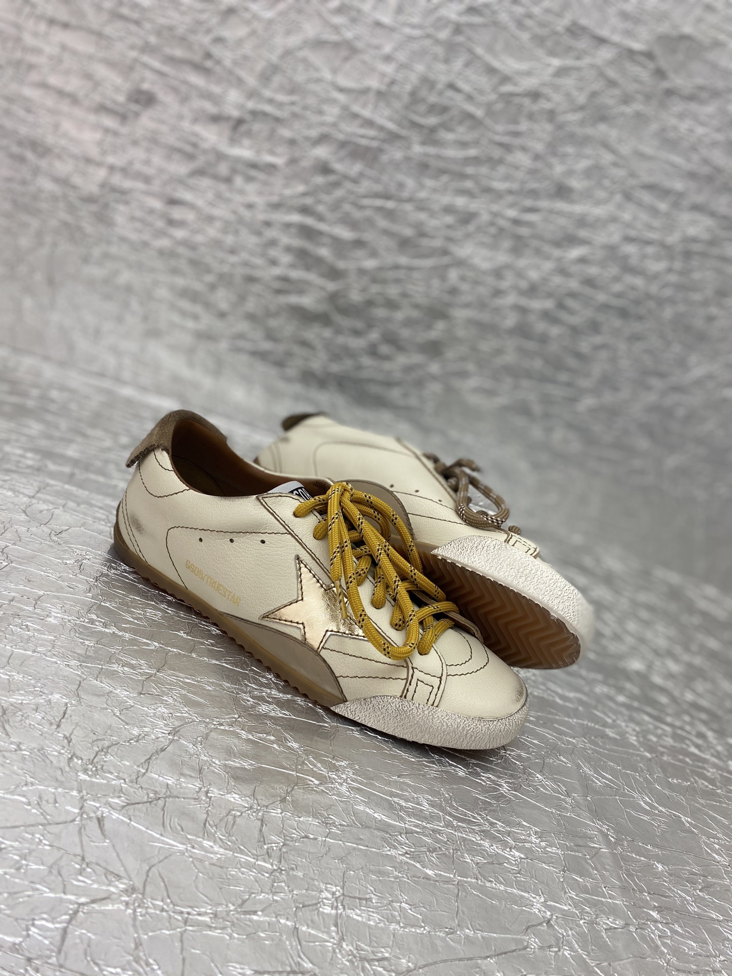 Golden Goose True-Star in white nappa leather with gold star and beige suede heel tab