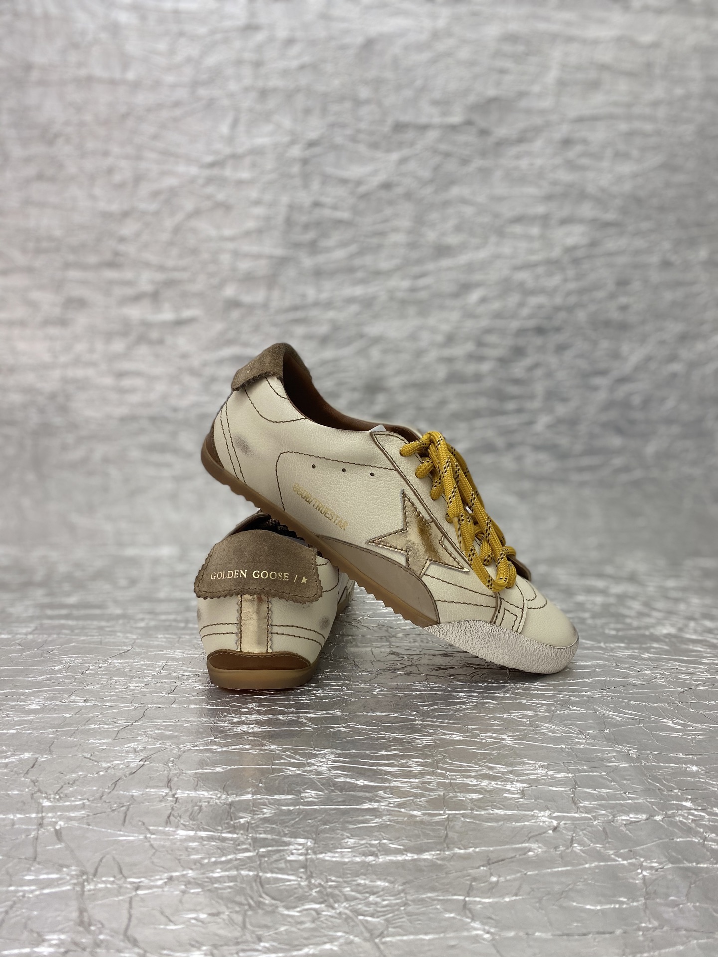 Golden Goose True-Star in white nappa leather with gold star and beige suede heel tab