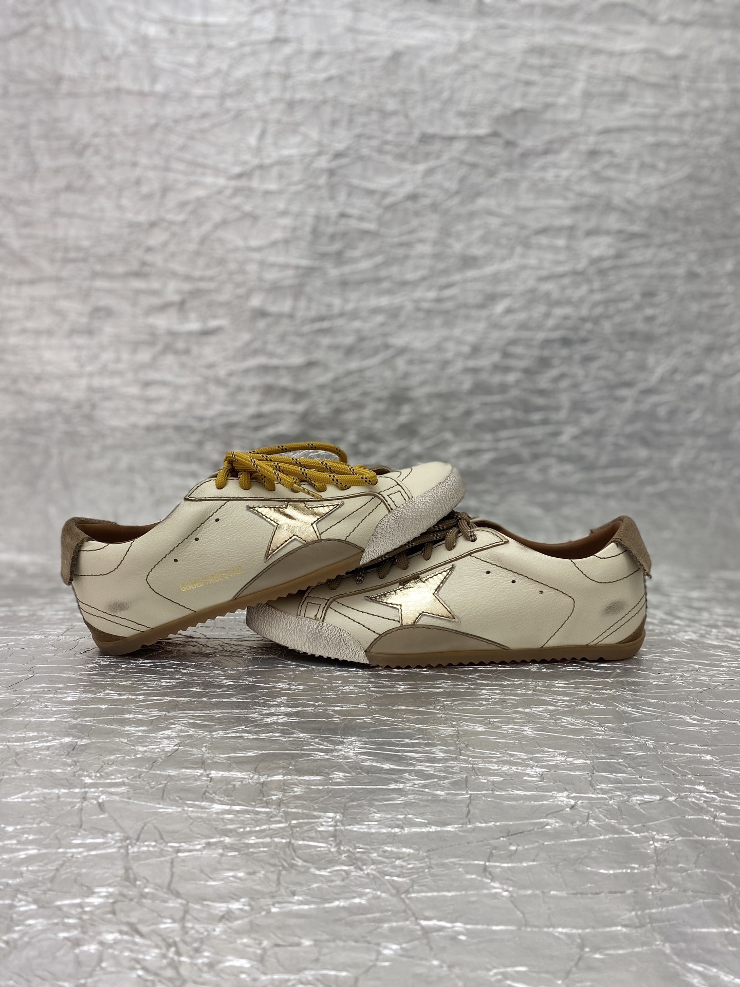 Golden Goose True-Star in white nappa leather with gold star and beige suede heel tab