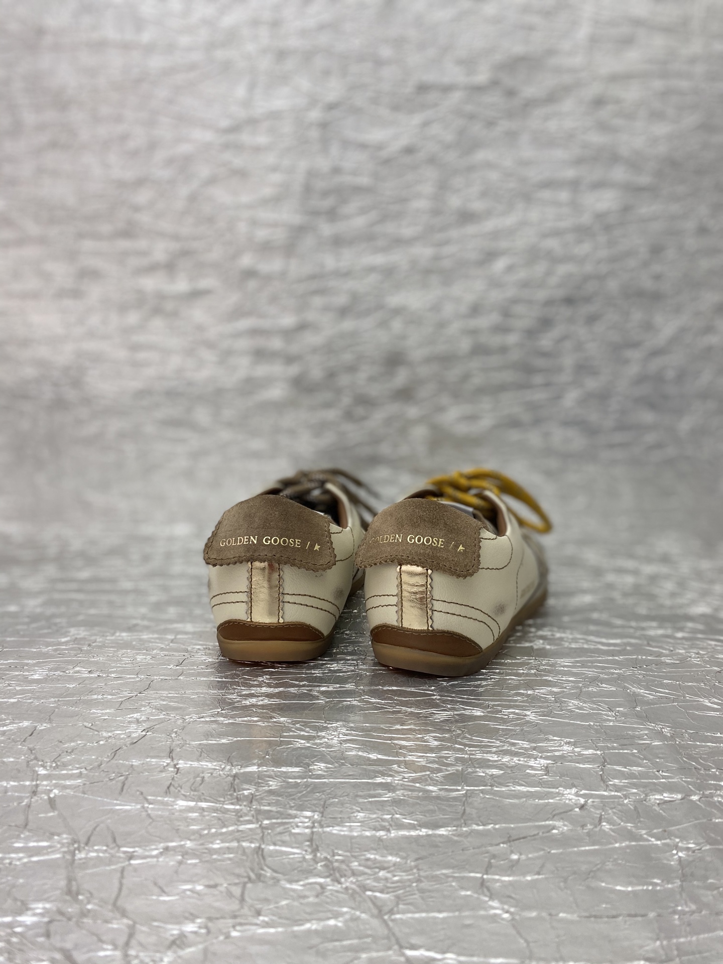 Golden Goose True-Star in white nappa leather with gold star and beige suede heel tab