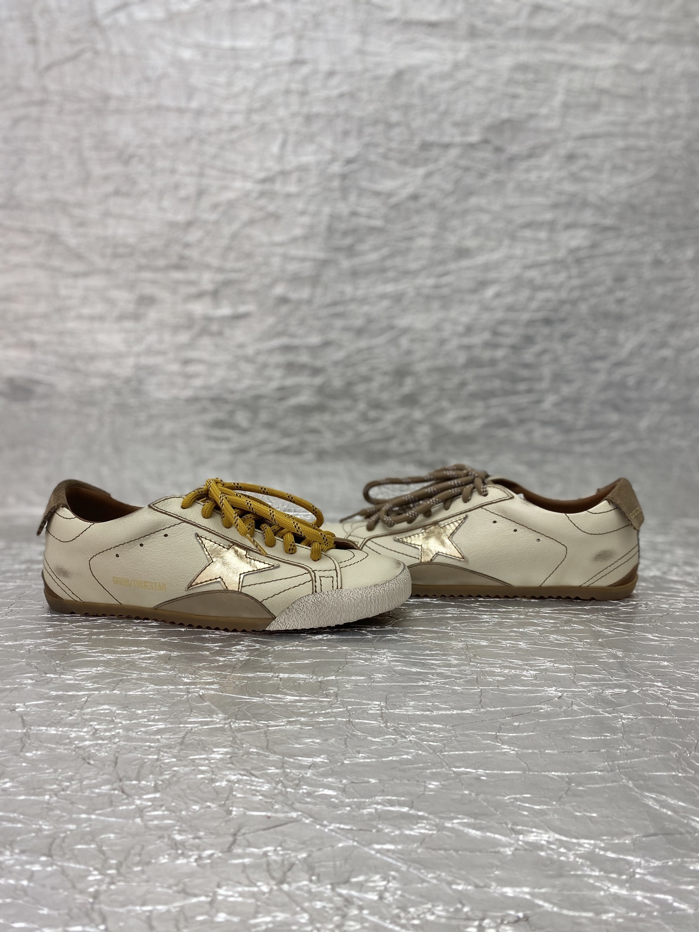 Golden Goose True-Star in white nappa leather with gold star and beige suede heel tab