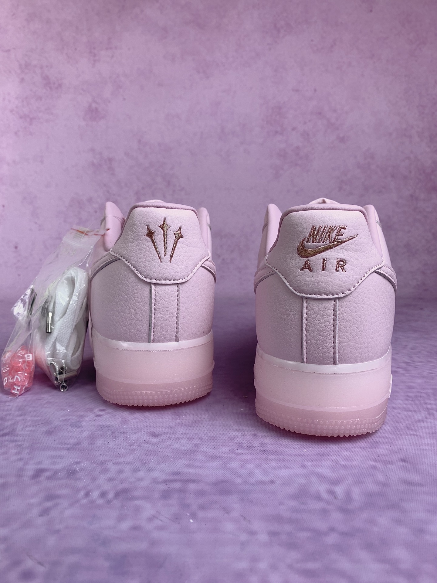 Drake NOCTA × Nike Air Force 1 "Pink Foam"