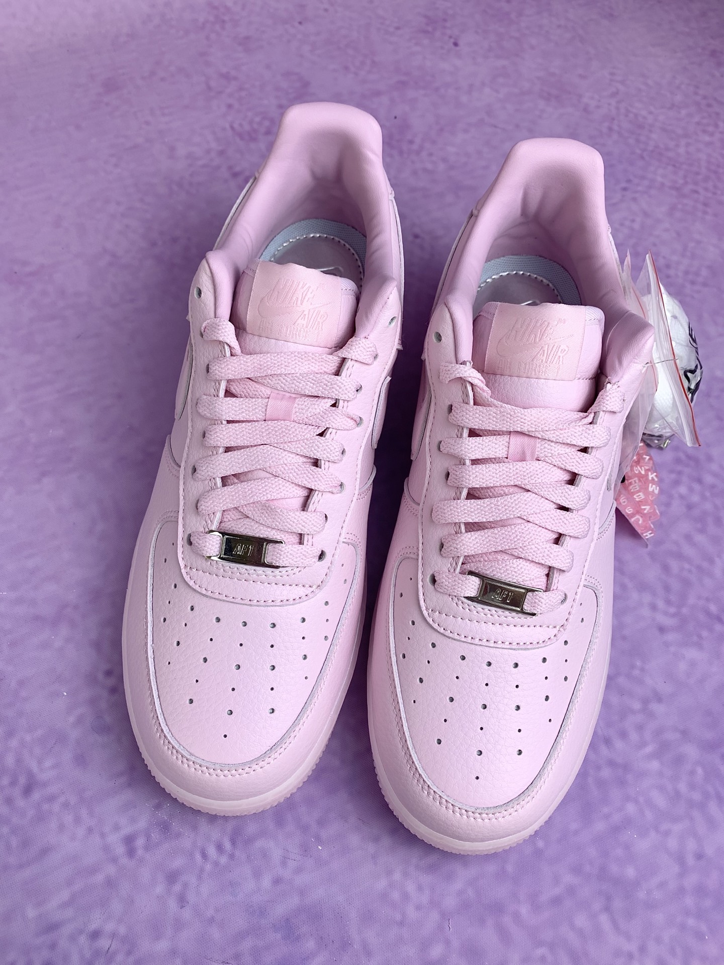 Drake NOCTA × Nike Air Force 1 "Pink Foam"