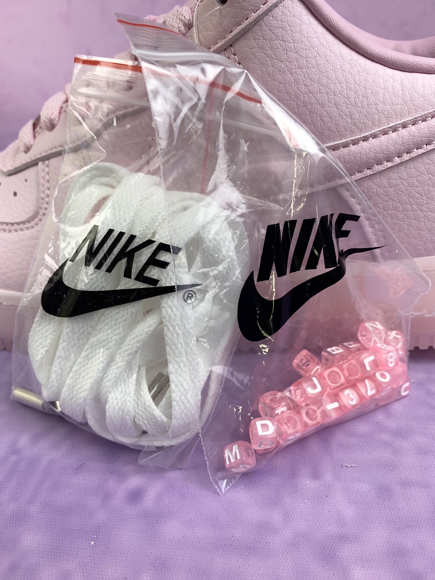 Drake NOCTA × Nike Air Force 1 "Pink Foam"