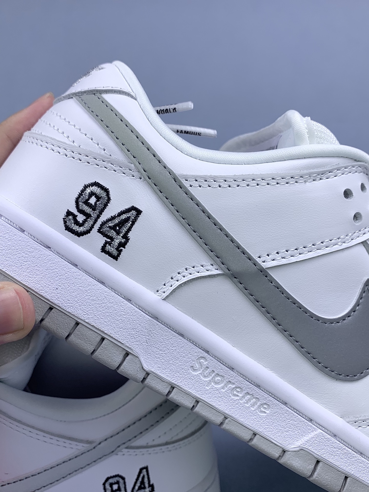Supreme × Nike SB Dunk Low "White/Metallic Silver" (25FW Week2)