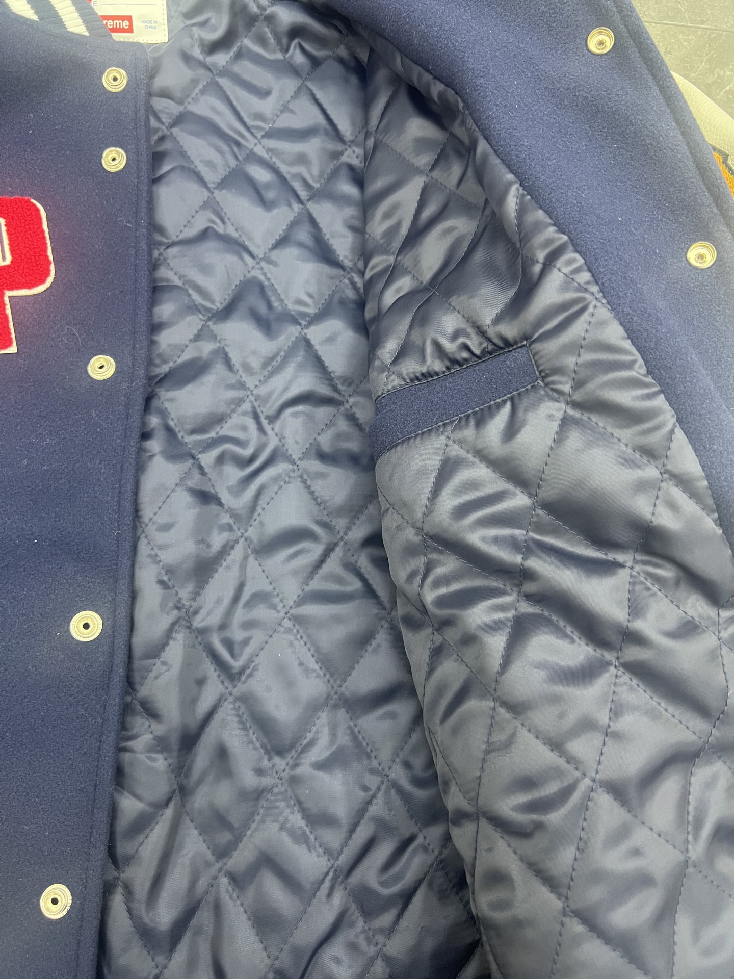 Supreme SS25 week3 Praises Varsity Jacket