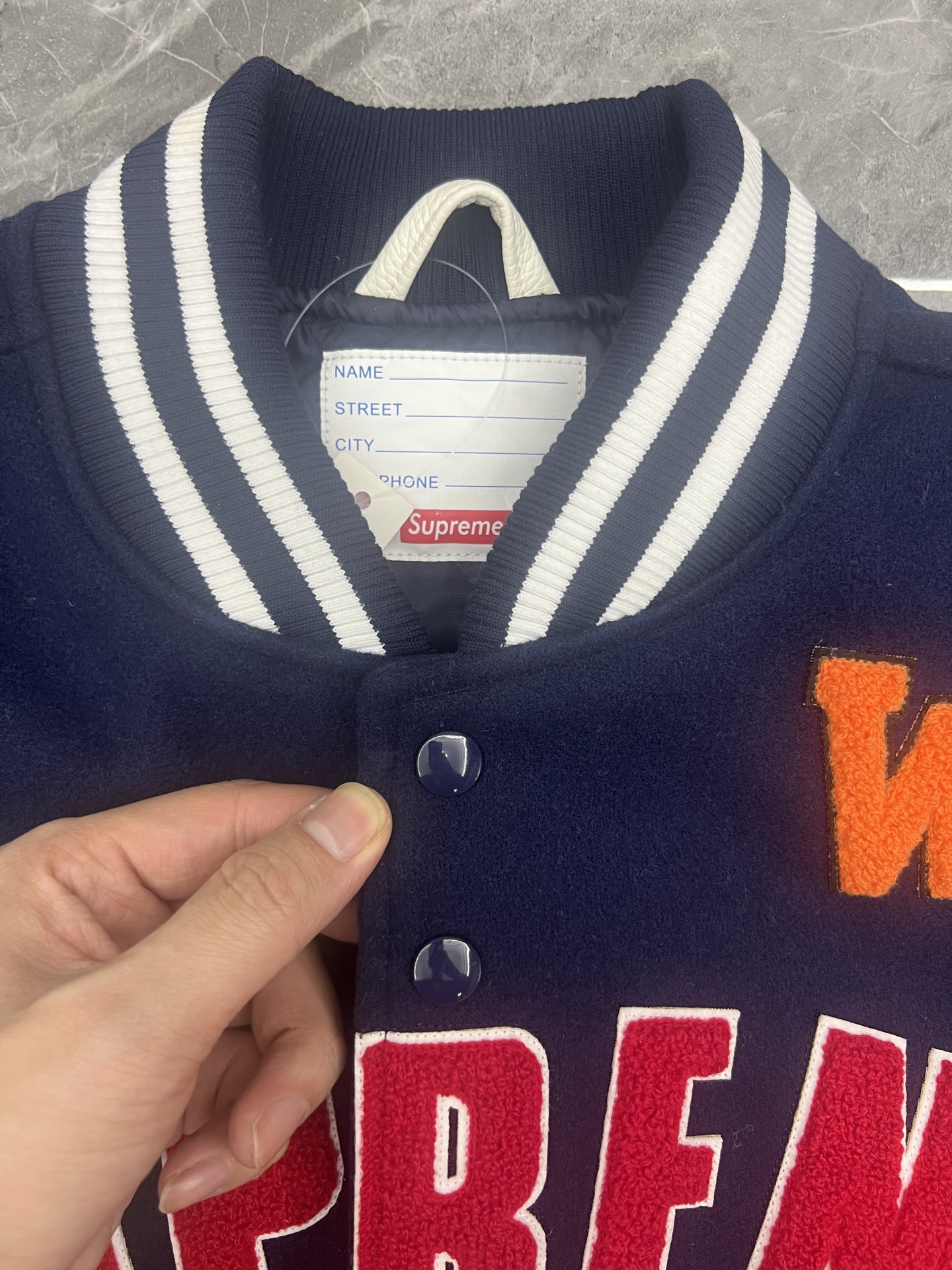 Supreme SS25 week3 Praises Varsity Jacket