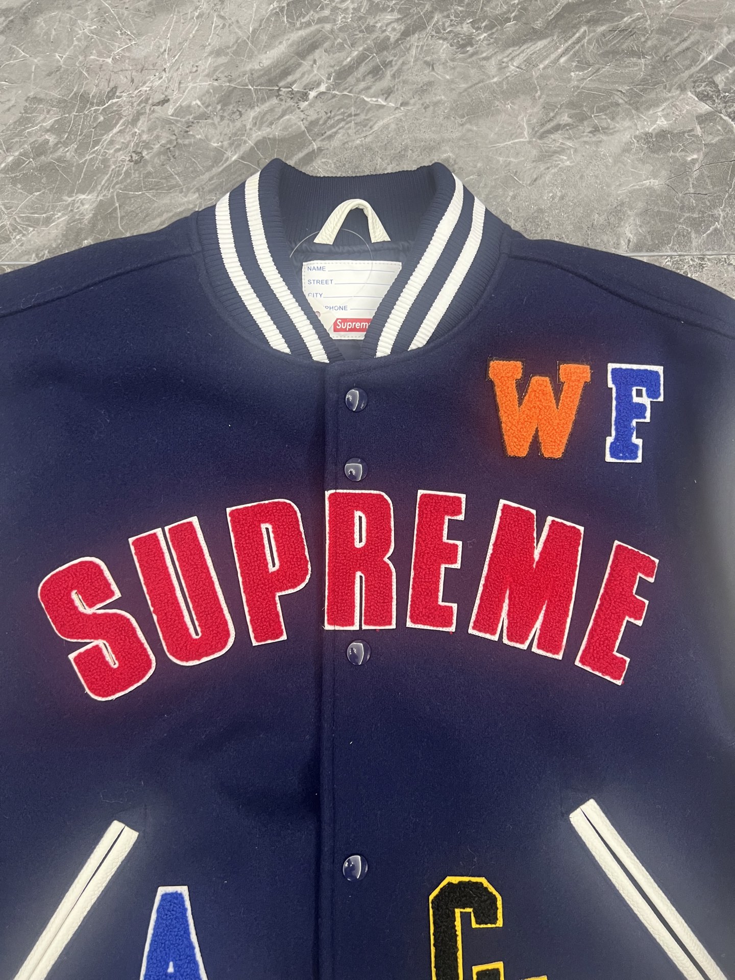 Supreme SS25 week3 Praises Varsity Jacket