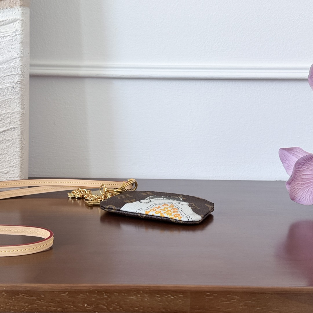 M25919 フォン ホルダー