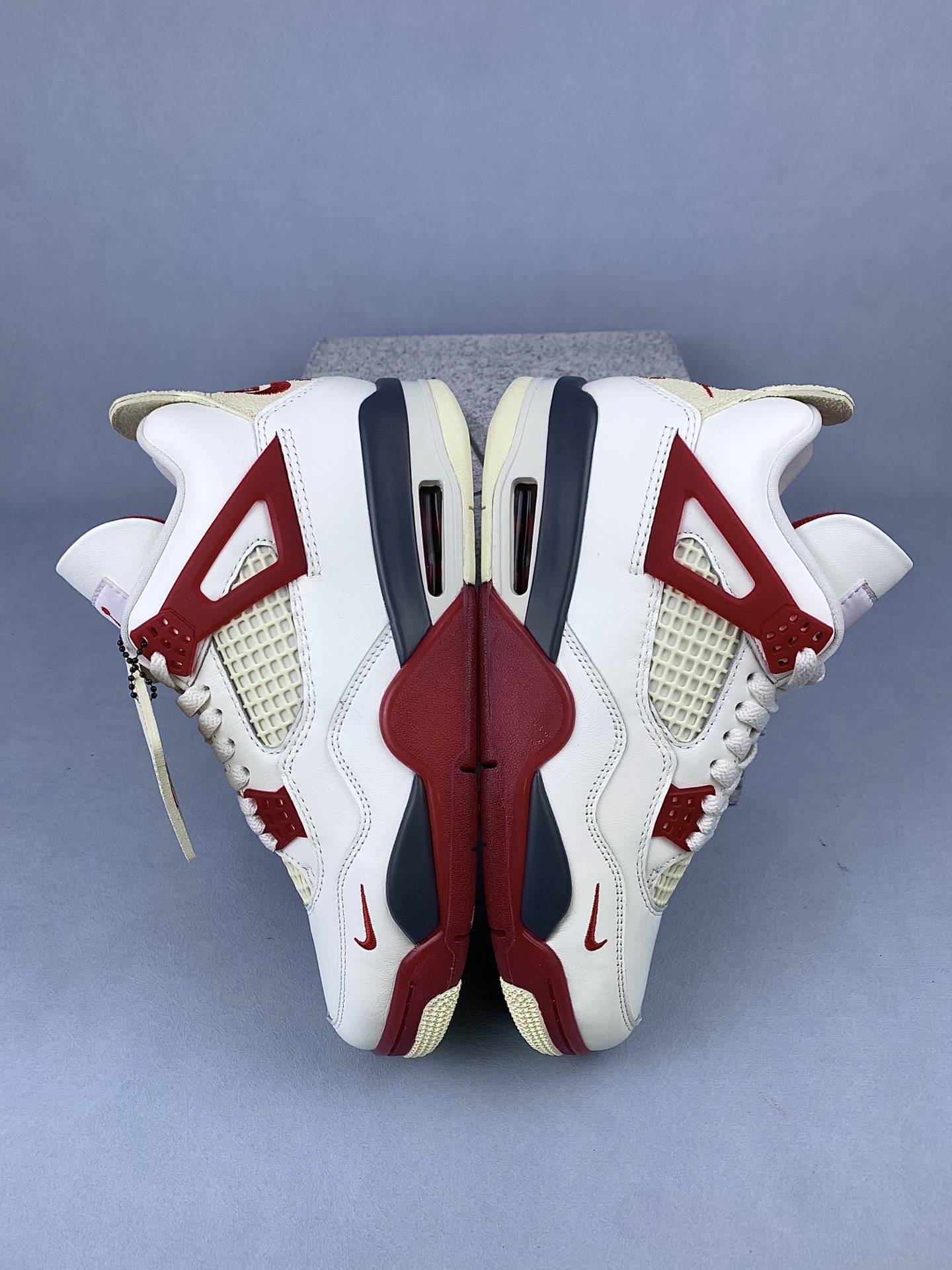 Nigel Sylvester × Nike Air Jordan 4 "Cinnabar"