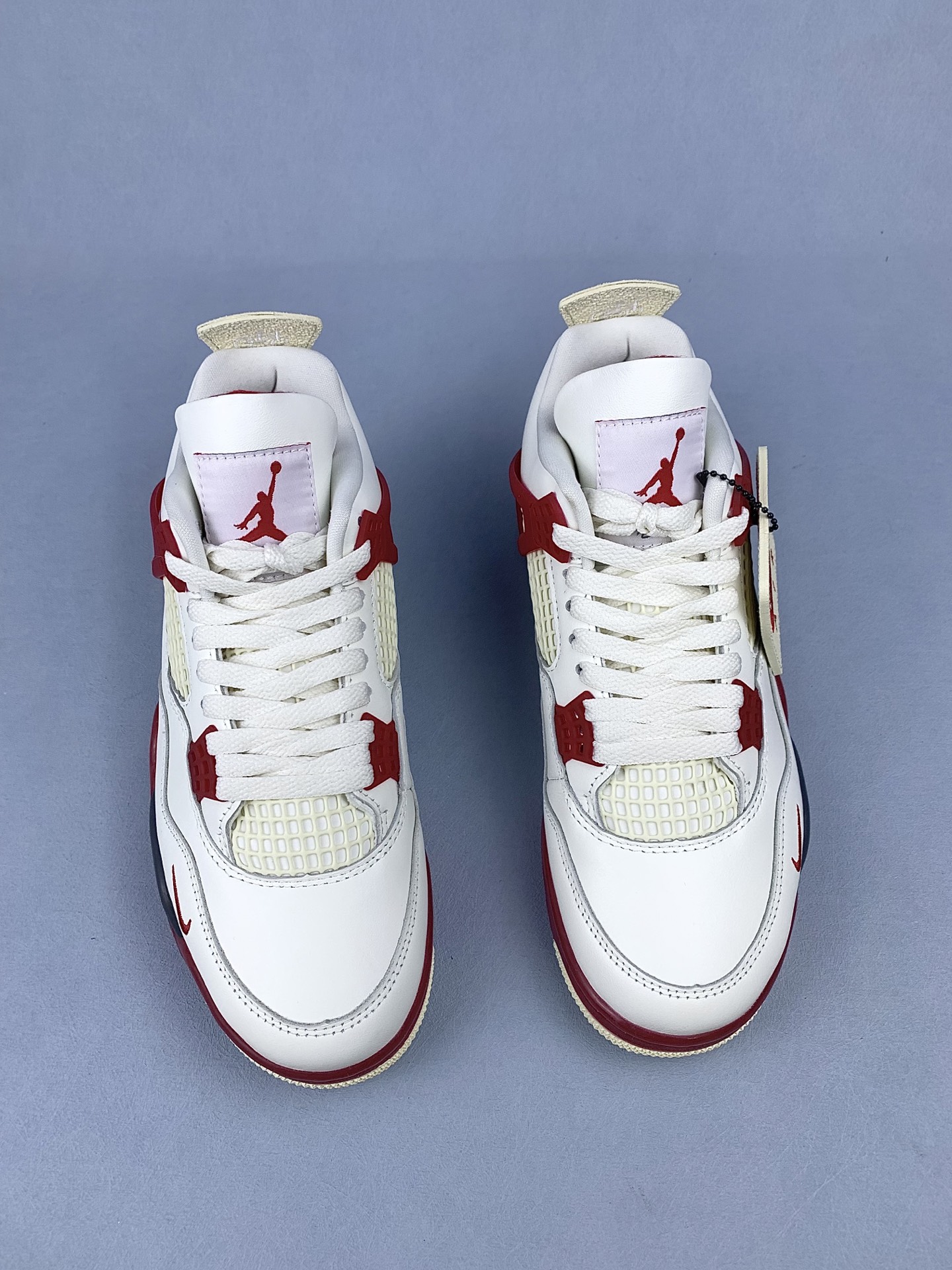 Nigel Sylvester × Nike Air Jordan 4 "Cinnabar"