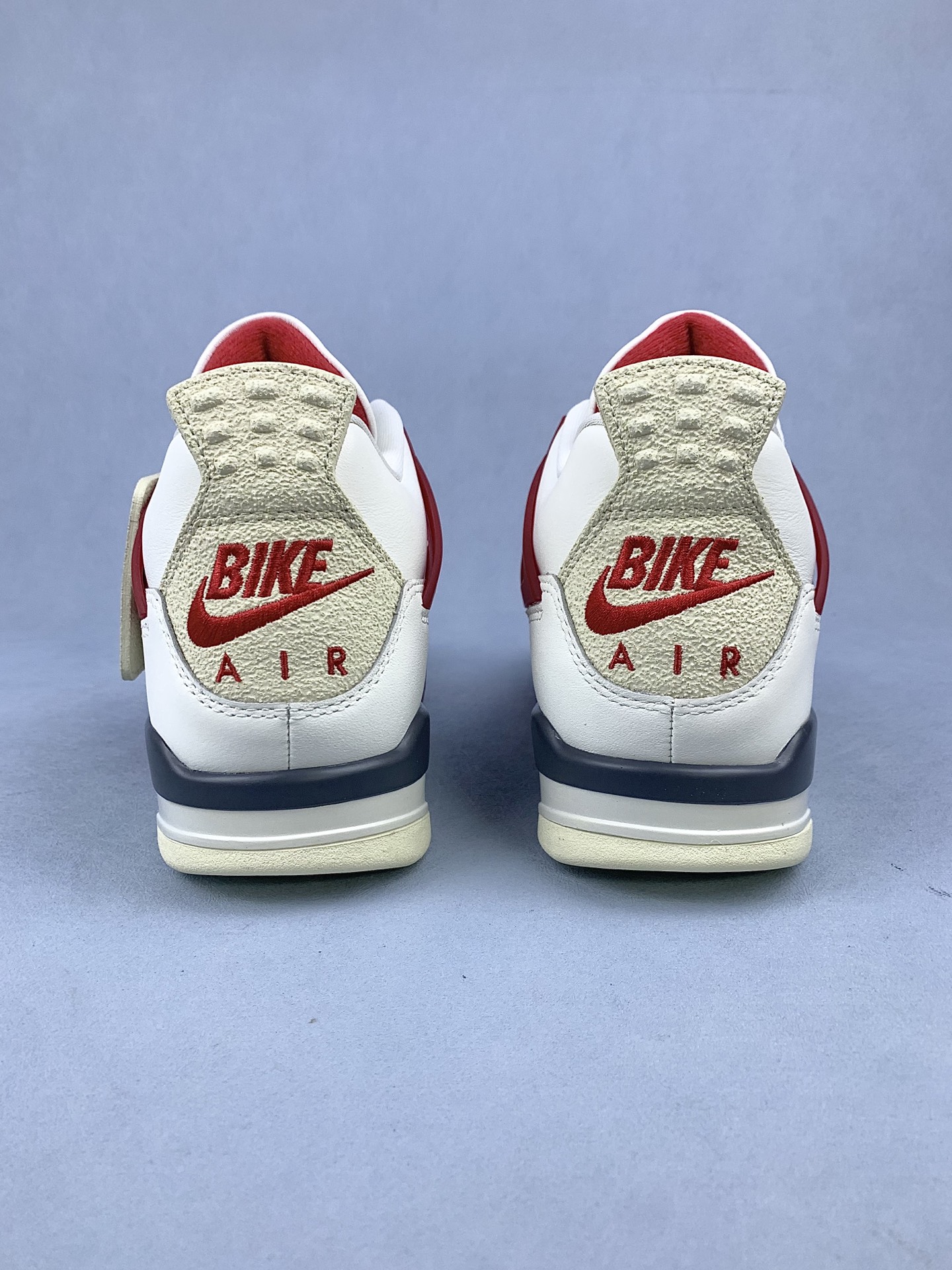 Nigel Sylvester × Nike Air Jordan 4 "Cinnabar"
