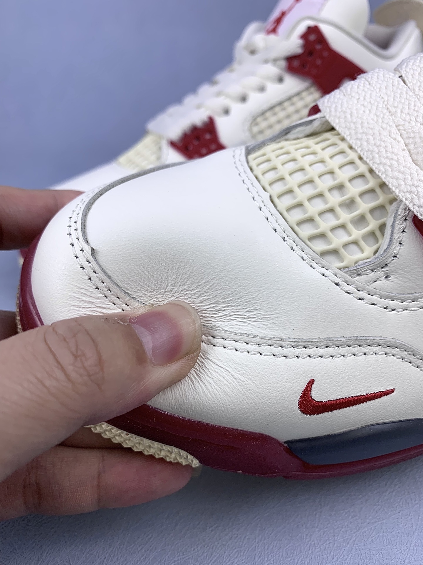 Nigel Sylvester × Nike Air Jordan 4 "Cinnabar"