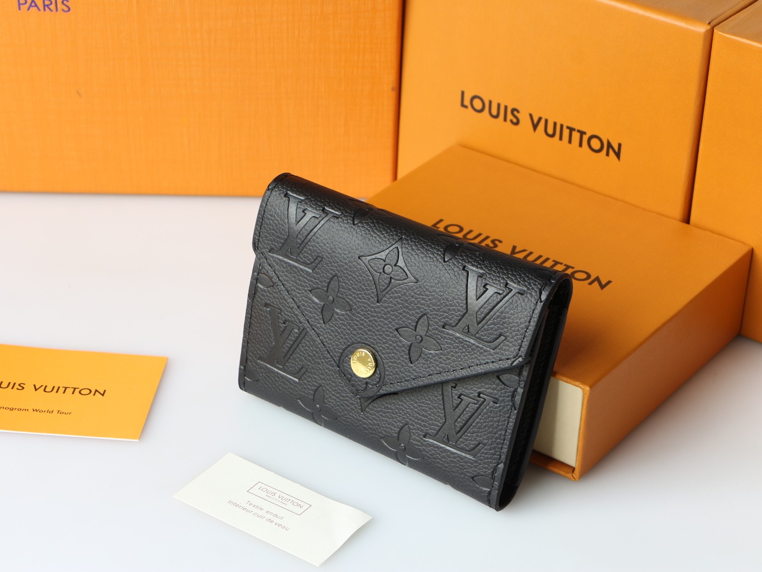 Louis Vuitton M64060 Taurillon Monogram Empreinte 二つ折り財布